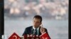 FILE - Ekrem Imamoglu, the new Mayor of Istanbul from Turkey's main opposition Republican People's Party (CHP), talks to members of foreign media in Istanbul, June 28, 2019. 