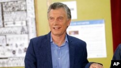 El presidente Mauricio Macri vota en Buenos Aires, Argentina. Octubre 27, 2019. AP Foto/Daniel Jayo