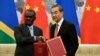 FILE - Chinese State Councilor and Foreign Minister Wang Yi shakes hands with Jeremiah Manele during a ceremony in Beijing, Sept. 21, 2019. Manele was selected as the new prime minister of the Solomon Islands on May 2, 2024.