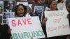 FILE - Burundi nationals from across the U.S. and Canada, along with supporters, demonstrate outside U.N. headquarters in New York, calling for an end to political atrocities and human rights violations unfolding in Burundi under the government of President Pierre Nkurunziza, April 26, 2016.