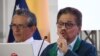 ARCHIVO: Iván Márquez lee en voz alta junto a Walter Mendoza, ambos representantes del grupo armado Segunda Marquetalia, el lunes 24 de junio de 2024, durante el inicio de conversaciones de paz con el gobierno colombiano, en Caracas, Venezuela.