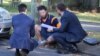 Australian police question one of two men arrested on charges related to fighting with Syrian militants in a raid in the Sydney suburb of Birrong, Australia, Nov. 3, 2016.