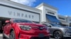 FILE - VinFast electric vehicles are parked before delivery to their first customers at a store in Los Angeles, California, March 1, 2023. 
