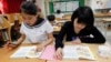 FILE - Students who defected from North Korea take supplementary lessons at the Hangyeore Middle and High School in Anseong, South Korea.