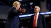 FILE - President Donald Trump hugs Senate candidate Rep. Kevin Cramer, R-N.D., during a campaign rally in Fargo, N.D., June 27, 2018. The conservative Koch brothers' network declared July 30 it will not help elect Cramer after determining he is no better than his Democratic rival, June 27, 2018. 