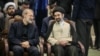 علی لاریجانی (چپ) در کنار مجتبی خامنه‌ای، پسر علی خامنه‌ای