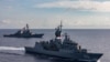 Arleigh Burke-class guided-missile destroyer USS John S. McCain (DDG 56) joined the Royal Australian Navy Anzac-class frigate HMAS Ballarat (FFH 155) during integrated operations in the South China Sea, Oct 27, 2020. (US Navy)