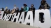 Protesters hold letters reading "NO THAAD" during a rally to oppose a plan to deploy an advanced U.S. missile defense system called Terminal High-Altitude Area Defense, or THAAD, near U.S. Embassy in Seoul, South Korea, April 26, 2017. 