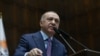 El presidente de Turquía, Tayyip Erdogan, se dirige a los miembros de su gobernante Partido AK durante una reunión en el Parlamento en Ankara, Turquía, el 19 de febrero de 2020. (Foto Reuters Vía Oficina de prensa presidencial turca). 