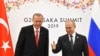FILE - Russian President Vladimir Putin, right, and Turkish President Recep Tayyip Erdogan attend their bilateral meeting on the sidelines of the G-20 summit in Osaka, June 29, 2019. 