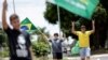 Brasileños acuden a votar en la segunda vuelta de elecciones presidenciales en la capital Brasilia el 30 de noviembre de 2022. 