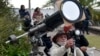 Chilenos y argentinos observan eclipse total de sol