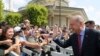 Turkey's President Recep Tayyip Erdogan speaks to his supporters after Friday prayers, in Ankara, Turkey, Aug. 23, 2019. Also on Friday, Erdogan discussed the situation in Syria with Russia's President Vladimir Putin.
