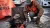 Haitian migrants work in a construction site in Mexico City, Mexico on Jan. 27, 2024. Some 141,000 people sought refuge in Mexico in 2023, a record number. Most were from Haiti, Honduras, and Cuba. They often work in the low-paid construction and commerce sectors. 
