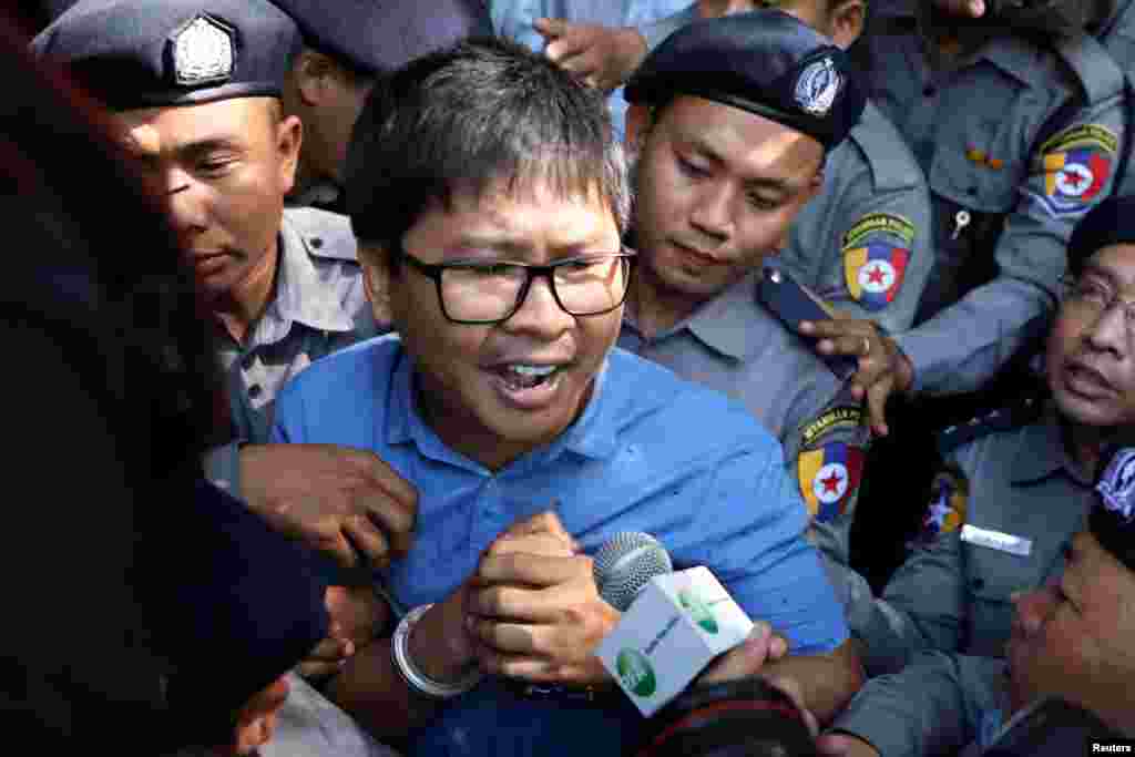 Reuters journalist Wa Lone arrives at the court in Yangon, Myanmar. Wa Lone and another Reuters journalist Kyaw Soe Oo were formally charged with violating the country&#39;s Official Secrets Act almost one month after they were allegedly given classified documents by two policemen over dinner.