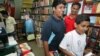 Harry Potter fans purchase copies of the final Potter book at a New Delhi bookstore, a high seller at Internet retailer Amazon, (File photo).