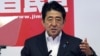 Japanese Prime Minister and leader of the ruling Liberal Democratic Party, Shinzo Abe, speaks during a press conference in Tokyo on July 11, 2016. 