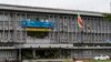 The Myanmar Economic Corporation (MEC) headquarters - one of the country's main military conglomerate under US sanctions - is seen in Yangon on September 15, 2016. - Myanmar cheered a US promise to end sanctions on Thursday, with punters in its commercial