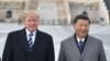 In this file photo taken on Nov. 8, 2017, U.S. President Donald Trump and Chinese President Xi Jinping pose at the Forbidden City in Beijing. 
