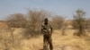 FILE - A Nigerien soldier takes a position during Flintlock 2014, a U.S.-led international training mission for African militaries, in Diffa, March 6, 2014.