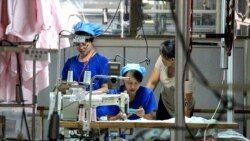 VOA Asia – Slowing economies result from trade war