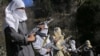 FILE - The Afghan Taliban has been quiet since news of the death of leader Mullah Akhtar Mansoor. Analysts, however, say high-ranking members likely are busy behind the scenes choosing a successor.