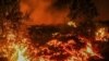 Lava from the eruption of Mount Nyiragongo is seen in Buhene, on the outskirts of Goma, Congo in the early hours of May 23, 2021.