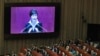 South Korean President Park Geun-hye, shown on a large screen, delivers a speech at the National Assembly in Seoul, South Korea, Oct. 24, 2016.