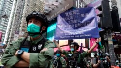 VOA Asia - Many more police, many fewer protesters in Hong Kong