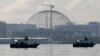 Patrol boats of the Philippine Navy Special Operations Group are positioned near the venue as they implement a no-sail zone policy at the restricted zone for next week's APEC (Asia-Pacific Economic Cooperation) Summit of Leaders Friday, Nov. 13, 2015.