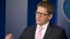 White House press secretary Jay Carney answers questions during his daily news briefing at the White House, March 10, 2014. 