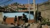 Miembros de la Fuerza de Acción de la Policía Nacional, o FAES, patrullan el barrio Antimano de Caracas. Enero 29 de 2019.