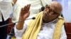 Leader of the Dravida Munnetra Kazhagam party M. Karunanidhi speaks at a press conference withdrawing support to India’s ruling United Progressive Alliance government, at the party office in Chennai, India, March 19, 2013