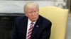 President Donald Trump talks to reporters in the Oval Office of the White House in Washington, May 10, 2017.