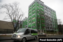 RUSSIA -- A car of Russian state-owned television station RT passes by the company's office in Moscow, October 27, 2017