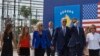 Le nouveau président américain Joe Biden (3e avant à d), sa femme, le Dr Jill Biden (3e à g), et d'autres membres de la famille marchent le long de la route nationale nommée d'après son défunt fils Joseph R. «Beau» Biden III, à Sojevo, Kosovo, le 17 août 2016. (AP/Visar Kryeziu)
