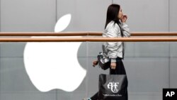 Países vecinos como India, Vietnam, Indonesia y Vietnam están cosechando los beneficios de los cambios de producción de los proveedores de las gigantes tecnológicas. Foto: AP.