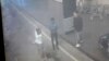 This image provided by Star TV of closed circuit television footage from Feb. 13, 2017, shows a woman, left, at Kuala Lumpur International Airport in Sepang, Malaysia, who police say was arrested Wednesday in connection with the death of Kim Jong Nam.