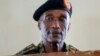 FILE - Uganda's former police chief Kale Kayihura appears at the military court in Kampala, Uganda, Aug. 24, 2018.