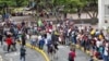 Venezolanos en corredor humanitario mientras esperaban a salir hacia su país desde Colombia. [Foto: Cortesía Alcaldía de Cali]