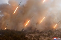 FILE - Missiles are seen in this undated picture released by North Korea's Korean Central News Agency, March 9, 2020.