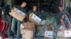 Indonesian and Japan military personnel unload relief aid from a Japan Air Force cargo plane at the Mutiara Sis Al-Jufri airport in Palu, Central Sulawesi, Indonesia, Oct. 6, 2018. 