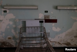 FILE - A dilapidated room is seen at the Jose Gregorio Hernandez Hospital in the slum of Catia in Caracas, Venezuela, Nov. 20, 2018.