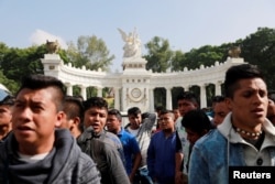 Students of Ayotzinapa College Raul Isidro Burgos demonstrate outside the Museum of Memory and Tolerance before a meeting between the parents of 43 missing students who disappeared on Sept. 26, 2014 and President-elect Andres Manuel Lopez Obrador in Mexico City, Sept. 26, 2018.