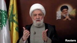 ARCHIVO - El líder del Hezbolá libanés, el jeque Naim Qassem, pronuncia un discurso desde un lugar desconocido, el 29 de noviembre de 2024, en esta imagen fija de un video.