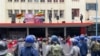 Police try to disperse members of Zimbabwe's Movement for Democratic Change in Harare, Nov. 20, 2019. (Columbus Mavhunga/VOA)