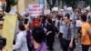 Protesters hold a banner which reads "No Leasing Land to China even for Anytime" during a demonstration against a draft law on the Special Economic Zone in Hanoi, Vietnam, June 10, 2018.