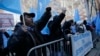 Uighurs and their supporters rally in front of the Permanent Mission of China to the United Nations in New York, March 15, 2018, to protest a sweeping crackdown against members of the ethnic minority in China.