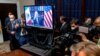 El presidente de México, Andrés Manuel López Obrador, aparece en una pantalla en la Casa Blanca, en Washington, durante una reunión virtual con su homólogo estadounidense, Joe Biden, el lunes 1 de marzo de 2021.