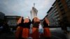 Nuns gather near a makeshift memorial outside Gemelli Hospital in Rome, where Pope Francis is being treated for double pneumonia, March 8, 2025. 